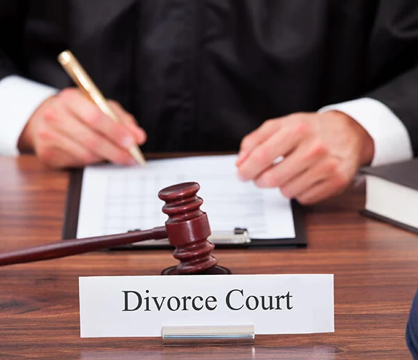 judge writing in divorce court